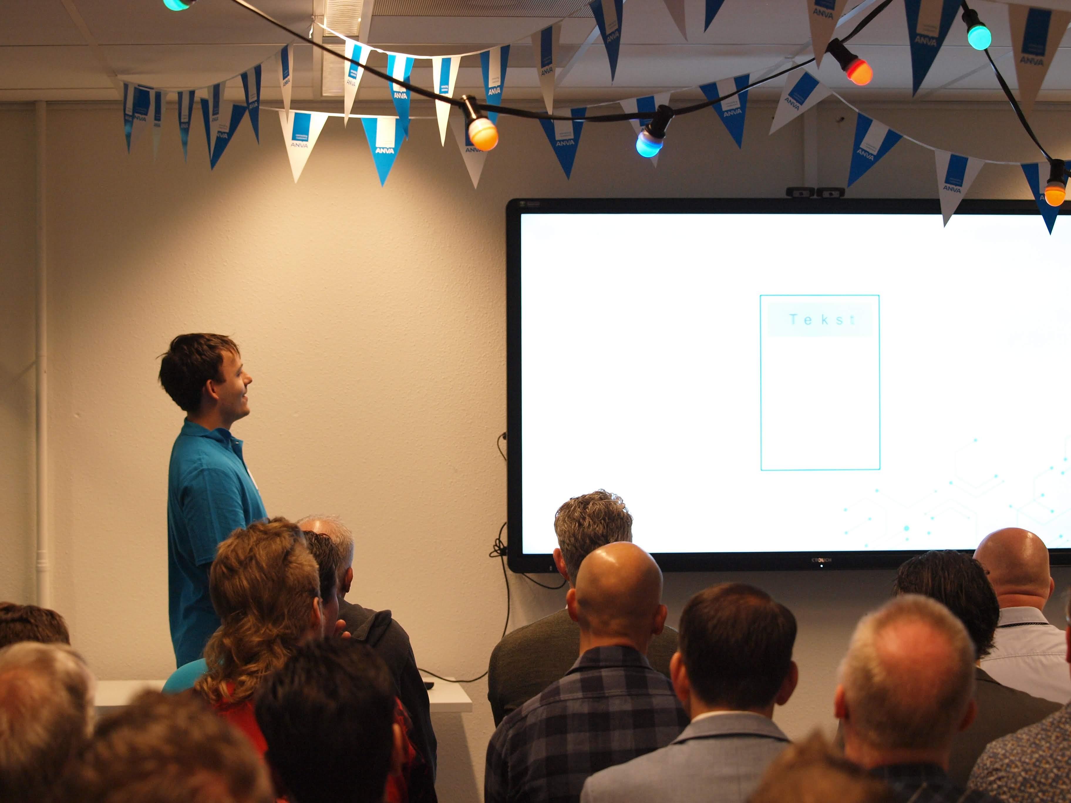 Robin Chung presenting in front of a group